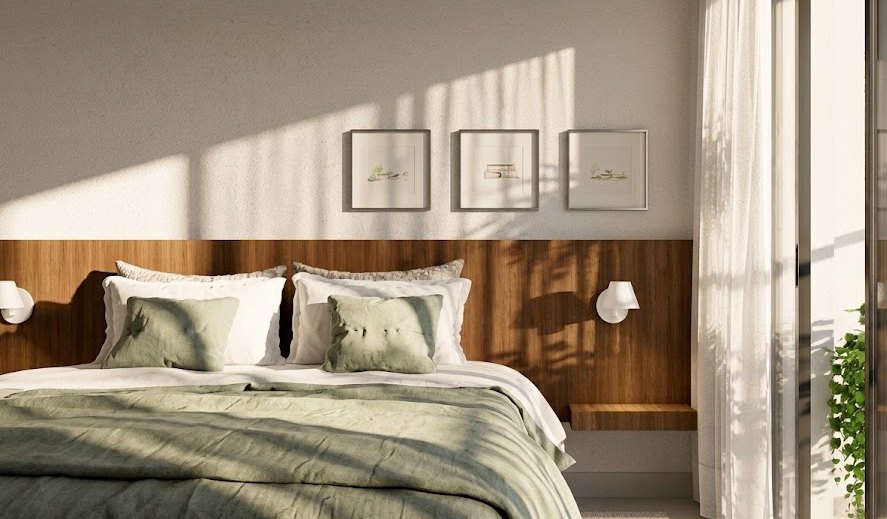 Suíte do Apto Tai, com cabeceira em madeira e roupa de cama verde